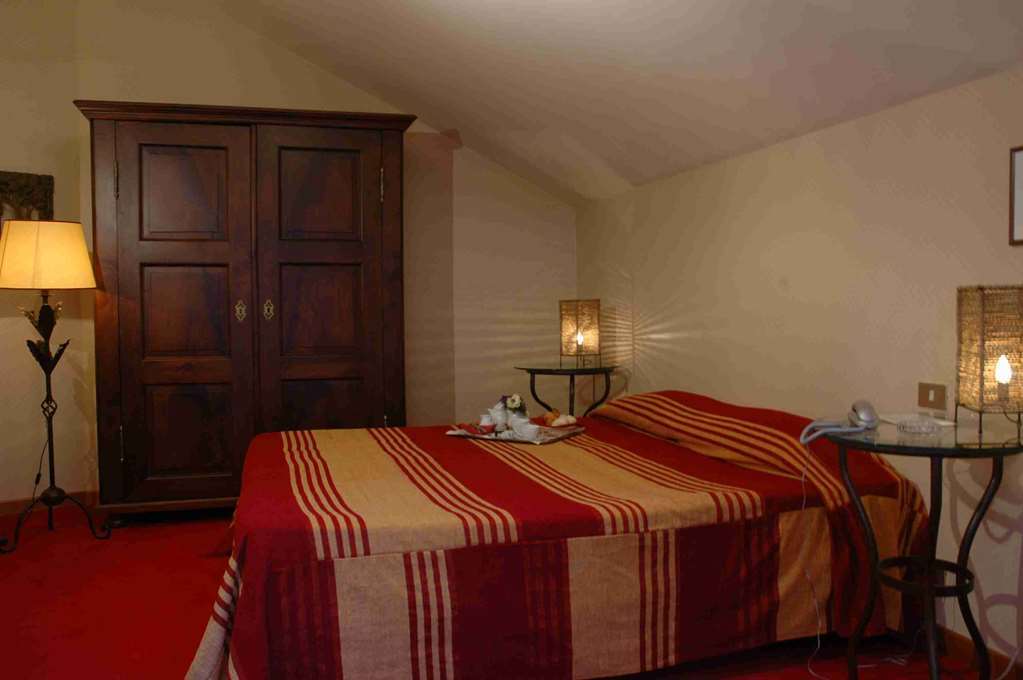Hostellerie Du Golf Pecetto Pokoj fotografie