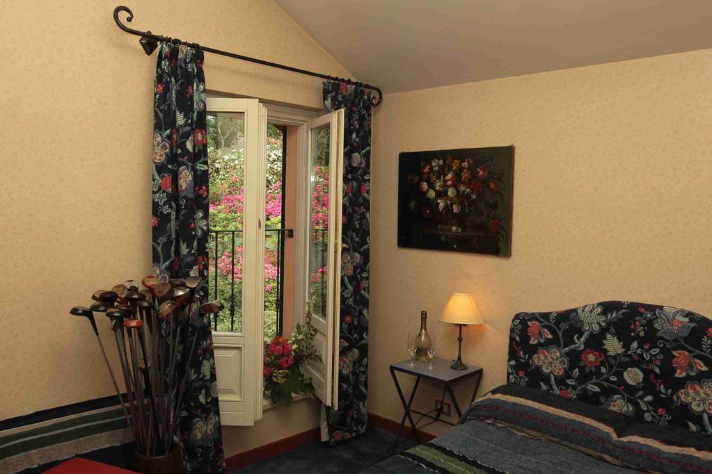 Hostellerie Du Golf Pecetto Pokoj fotografie